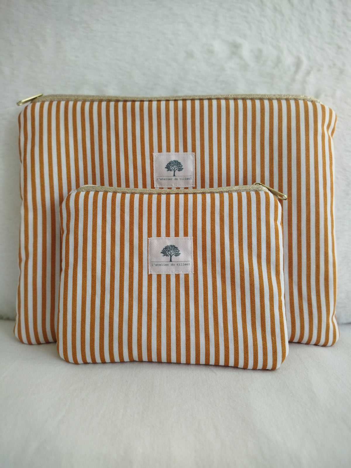Pochette zippée artisanal cousu main tissu rayure camel